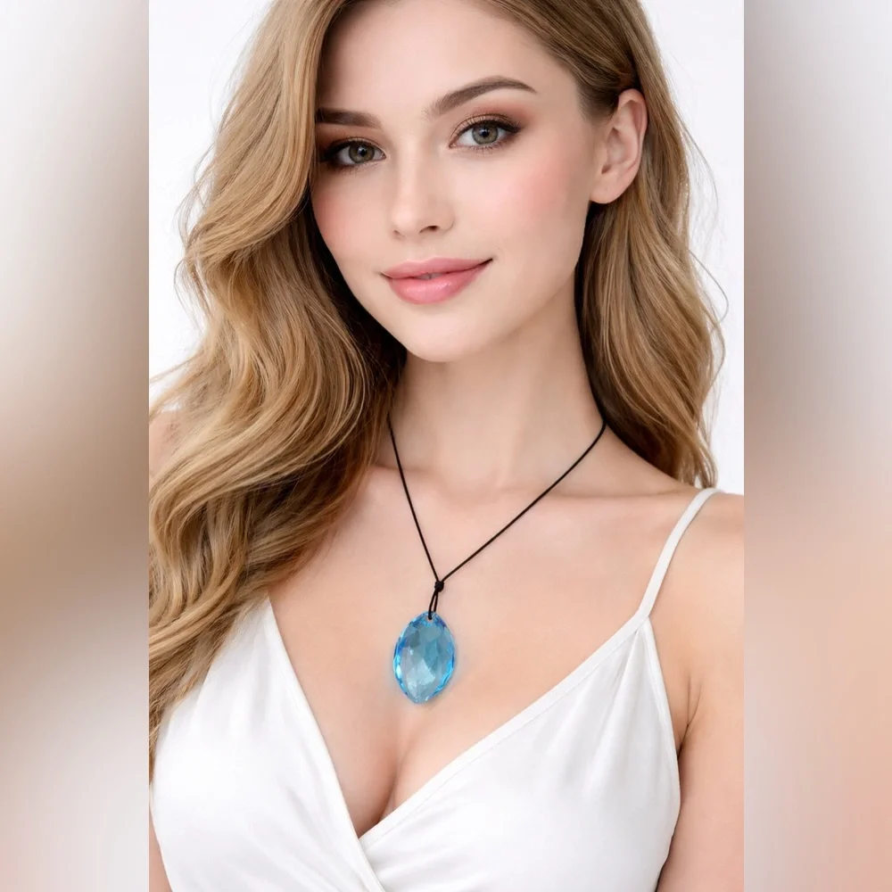 SWAROVSKI Aqua Scuro Crystal Teardrop Pendant Necklace On Black Cord-5083475